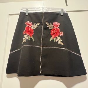 NWT Black mini skirt with embroidered floral design